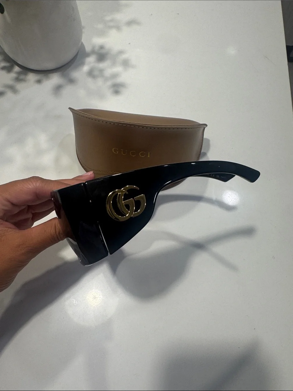 Gucci Black Shield Sunglasses with Gold GG Emblem